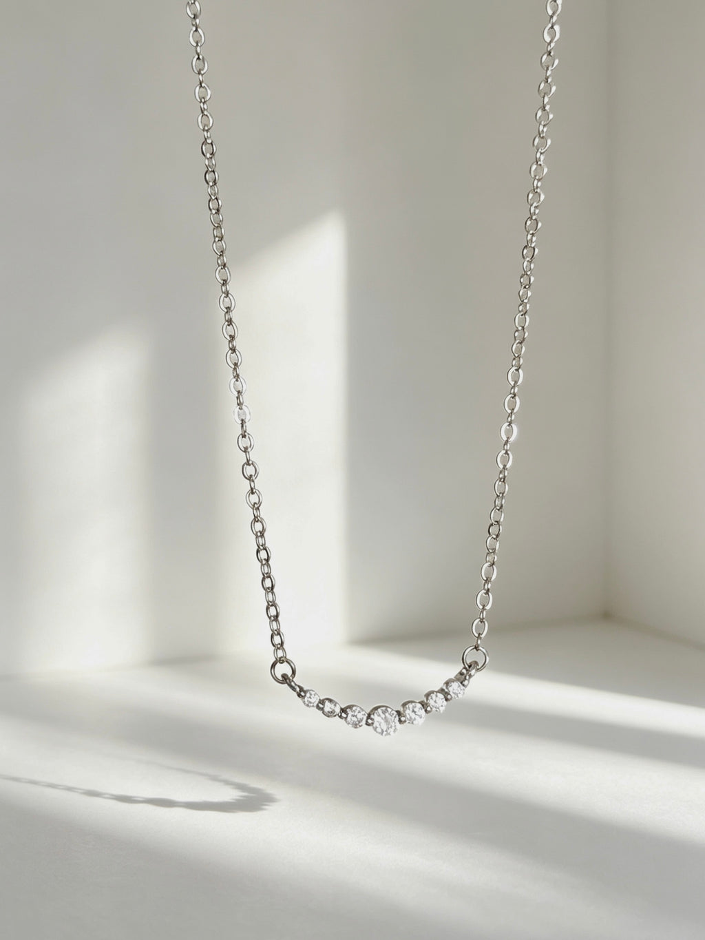 Lunar Curve Graduated Crystal Necklace